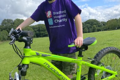 Alex uses pedal power to raise money for children in hospital