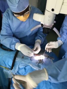 Malawi Surgeon Wakisa Malwafu insert a cochlear implant under the guidance of Bradford ENT surgeons
